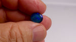 Experience the mesmerizing beauty of this Amazing 2.95ct Blue Green Australian Black Opal. With its stunning colors and impressive 2.95ct size, this opal is a true gemstone treasure. Perfect for jewelry, this opal is sure to add a touch of elegance and sophistication to any outfit our addition to any gemstone collection

Origin- Lightning Ridge Australia&nbsp;

Opal weight- 2.95ct Australian Black Opal

Cut- Freeform Round Cabochon

Size- 11.7x10.2mm