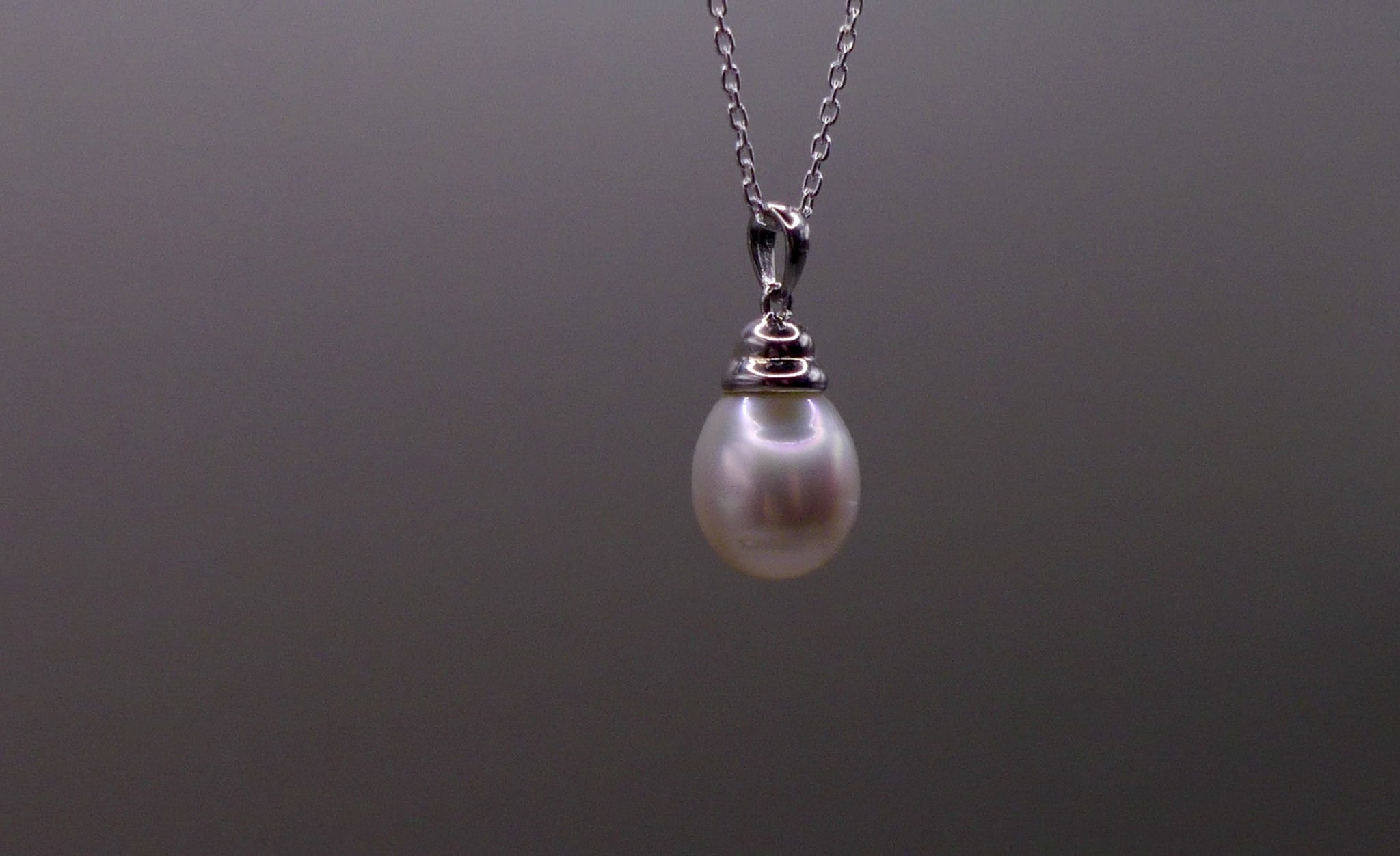 This beautiful sterling silver drop pearl pendant is the perfect addition to any jewelry collection. Made with high-quality materials, the elegant design exudes sophistication and grace. The lustrous South Sea pearl centerpiece adds a touch of luxury and can elevate any outfit. Enhance your style with this timeless accessory.

Pearl- South Sea Drop Pearl

Luster- AAA/AA

Size- 10mm

Setting- Sterling SIlver

Chain- Sterling Silver

Handcrafted By Australian Artisans