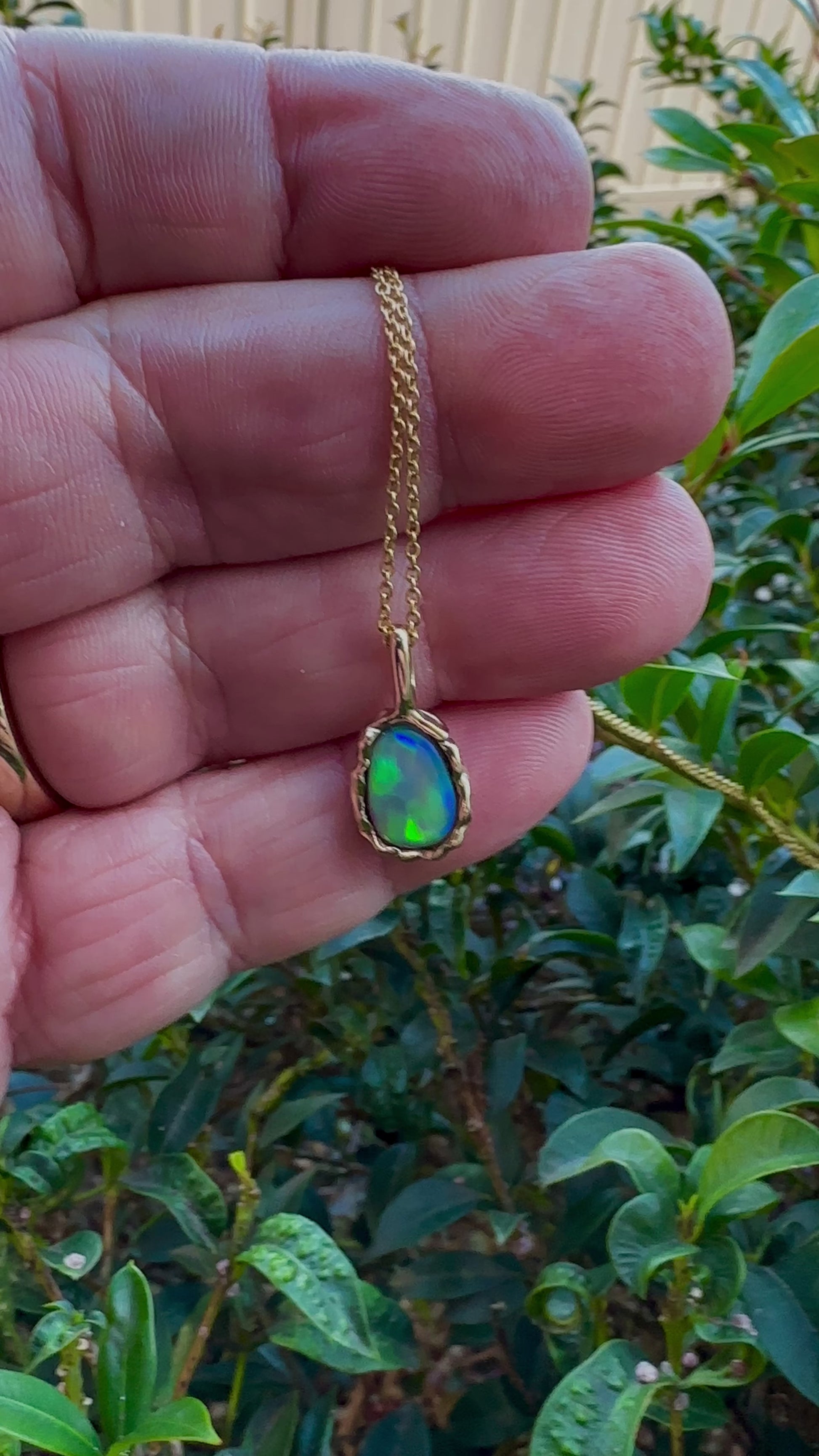 Uncover the stunning Australian opal beauty of our 9k Gold Lightning Ridge Opal pendant. Featuring a unique lava-inspired handcrafted design with green, blue, and gold tones, this high-quality masterpiece is a lasting addition to your collection.

Origin- Ethically Mined in Lightning Ridge Australia

Opal Weight- 1.5ct Lightning Ridge Crystal Opal

Setting- 9k Gold Lava inspired custom design

Chain- 9k Gold Cable Chain 45cm in Length

Treatments- None- 100% Solid Australian Opal
