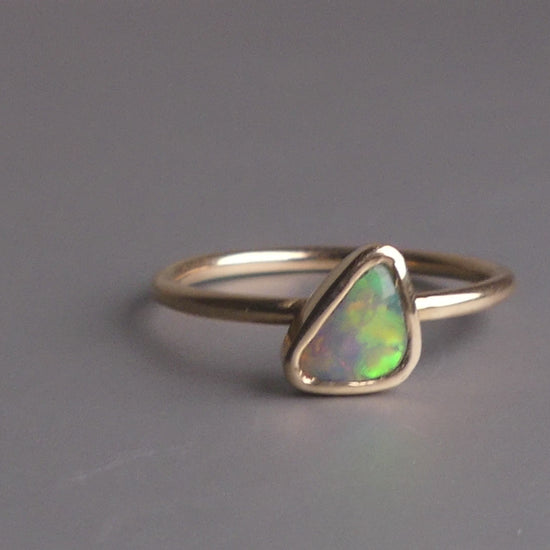 This Elegant 9ct Gold Ring is perfect for any occasion. Made with a stunning Crystal Opal from Lightning Ridge, displaying the full spectrum of colors, making it a unique and eye-catching piece. Its simple and elegant design adds a touch of sophistication to any outfit.

Origin- Lightning Ridge Australia

Opal- Australian Crystal Opal mined in Lightning Ridge Australia

Setting- 9ct solid Gold Bezel set

Size- 6 1/2 us

Designed and Handcrafted by skilled Australian Artisans
