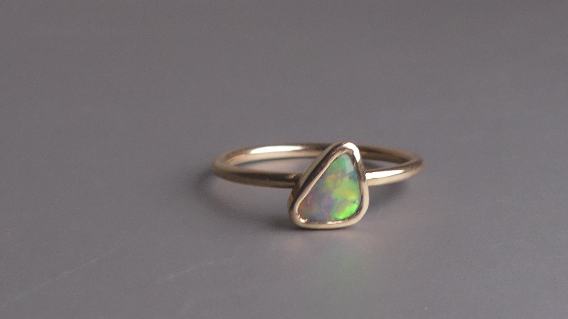 This Elegant 9ct Gold Ring is perfect for any occasion. Made with a stunning Crystal Opal from Lightning Ridge, displaying the full spectrum of colors, making it a unique and eye-catching piece. Its simple and elegant design adds a touch of sophistication to any outfit.

Origin- Lightning Ridge Australia

Opal- Australian Crystal Opal mined in Lightning Ridge Australia

Setting- 9ct solid Gold Bezel set

Size- 6 1/2 us

Designed and Handcrafted by skilled Australian Artisans
