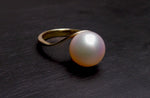 Expertly crafted and adorned with a lustrous South Sea pearl, this 14k gold ring exudes elegance and sophistication. Each pearl is hand-selected for its stunning size and natural colors, making each ring one-of-a-kind. Elevate any outfit with this timeless and luxurious piece.

Pearl- South Sea

Size- 11mm

Luster- AAA/AA

Setting- 14k Gold Handcrafted

Size- 7us

Handcrafted By Australian Artisans.
