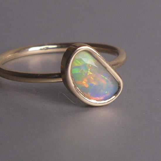 This Elegant 9ct Gold Ring is perfect for any occasion. Made with a stunning Crystal Opal from Lightning Ridge, displaying the full spectrum of colors, making it a unique and eye-catching piece. Its simple and elegant design adds a touch of sophistication to any outfit.

Origin- Lightning Ridge Australia

Opal- Australian Crystal Opal mined in Lightning Ridge Australia

Setting- 9ct solid Gold Bezel set

Size- 6 1/2 us

Designed and Handcrafted by skilled Australian Artisans