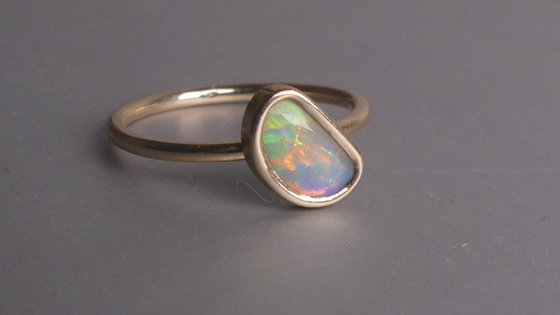 This Elegant 9ct Gold Ring is perfect for any occasion. Made with a stunning Crystal Opal from Lightning Ridge, displaying the full spectrum of colors, making it a unique and eye-catching piece. Its simple and elegant design adds a touch of sophistication to any outfit.

Origin- Lightning Ridge Australia

Opal- Australian Crystal Opal mined in Lightning Ridge Australia

Setting- 9ct solid Gold Bezel set

Size- 6 1/2 us

Designed and Handcrafted by skilled Australian Artisans