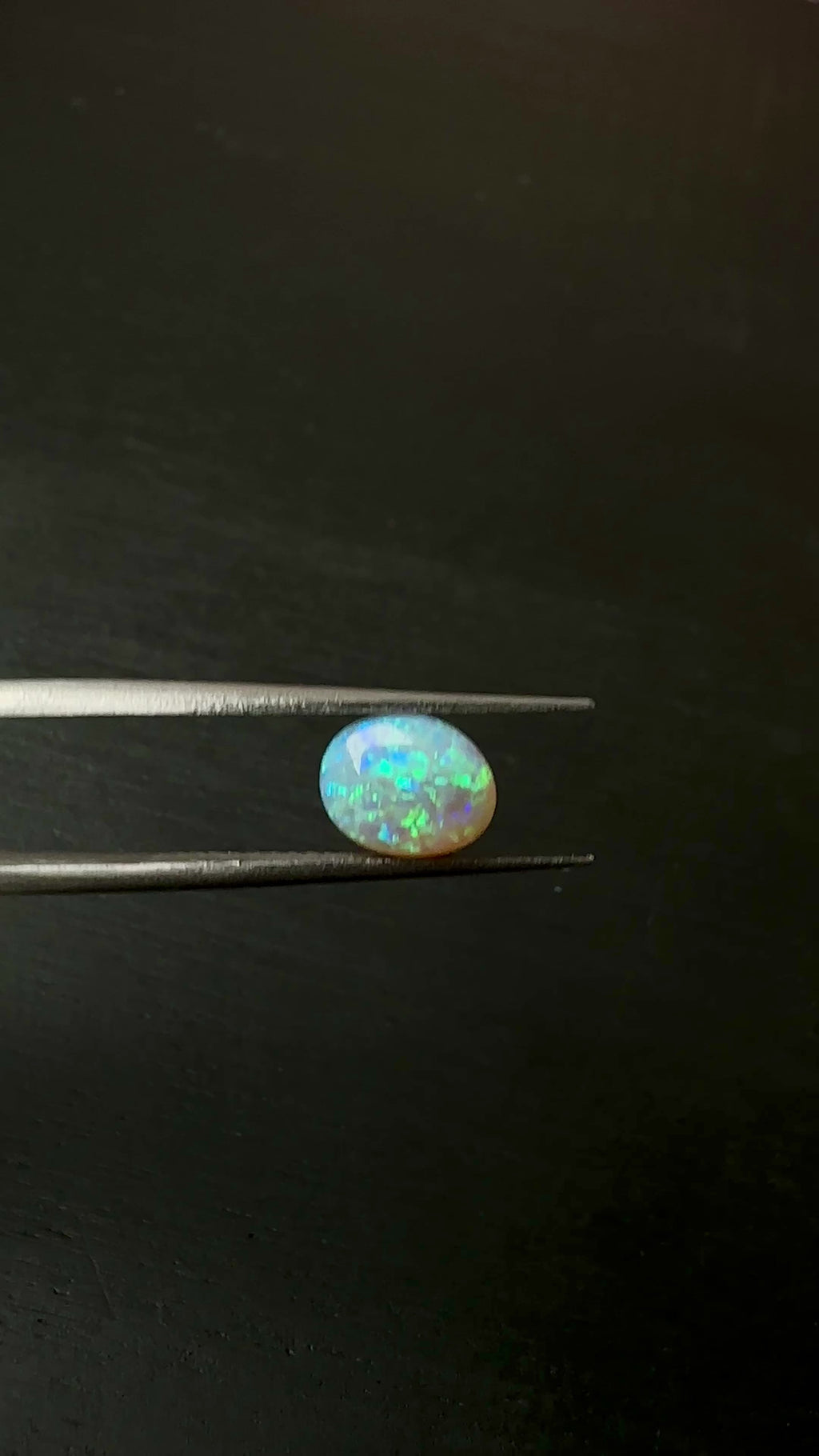 Discover the beauty of this 0.95ct Australian Crystal Opal, ethically mined from Lightning Ridge. Admire the mesmerizing blue and green tones of this truly unique gemstone.

Origin- Ethically Mined in Lightning Ridge Australia

Pattern- Displaying the highly desirable chaff pattern displaying blue green hues

Opal Weight- 0.95ct Lightning Ridge Crystal Opal

Size- 7 x 6 x 3.2m

Cut- Freeform Medium Dome Cabochon