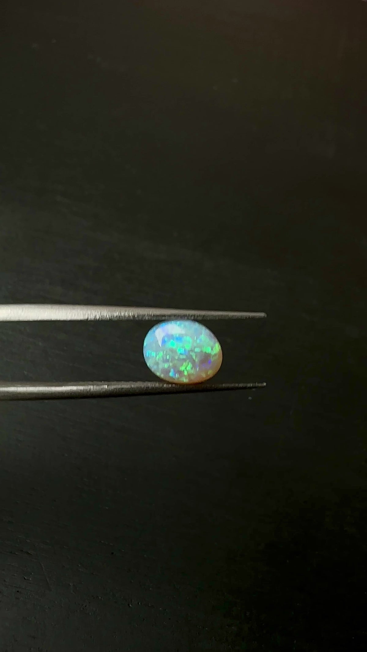 Discover the beauty of this 0.95ct Australian Crystal Opal, ethically mined from Lightning Ridge. Admire the mesmerizing blue and green tones of this truly unique gemstone.

Origin- Ethically Mined in Lightning Ridge Australia

Pattern- Displaying the highly desirable chaff pattern displaying blue green hues

Opal Weight- 0.95ct Lightning Ridge Crystal Opal

Size- 7 x 6 x 3.2m

Cut- Freeform Medium Dome Cabochon