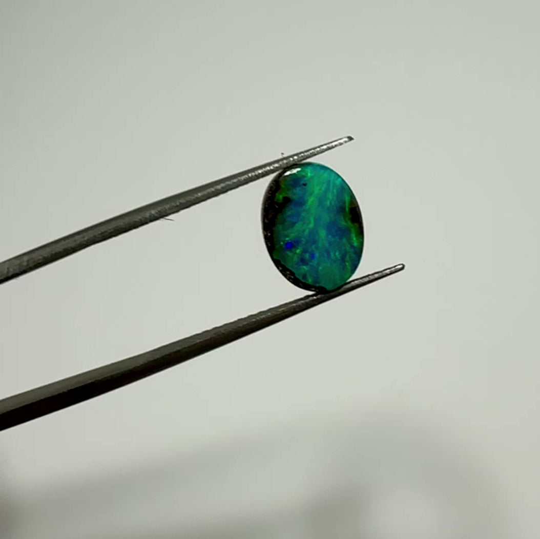 Dazzle your jewelry collection with this mesmerizing Australian Boulder Opal. Its stunning greens and blues are perfect for any design.

Origin- Ethically mined in Queensland Australia

Weight- 1.6c

Size- 9 x 7mm