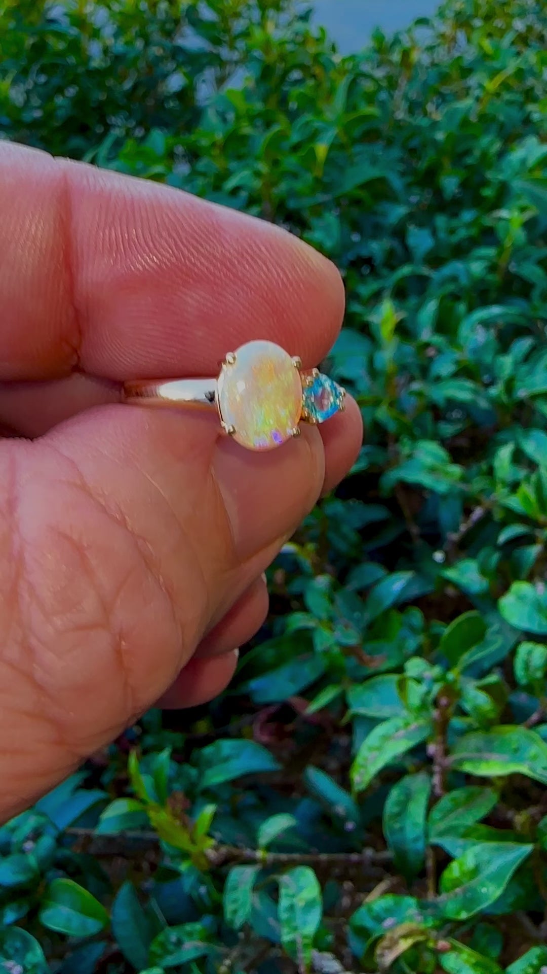 Introducing our stunning 14k Gold Australian Crystal Opal Ring. Ethically sourced from Lightning Ridge Australia, its mesmerizing play-of-color is unlike any other. Each piece is truly one-of-a-kind

Origin- Lightning Ridge Australia

Opal Weight- 1ct Australian Crystal Opal

Setting- 14k Claw Setting

Accent Stone- Swiss Blue Topaz

Ring Size- 6 1/2us.

Handcrafted with precision and passion by Australian Artisans.