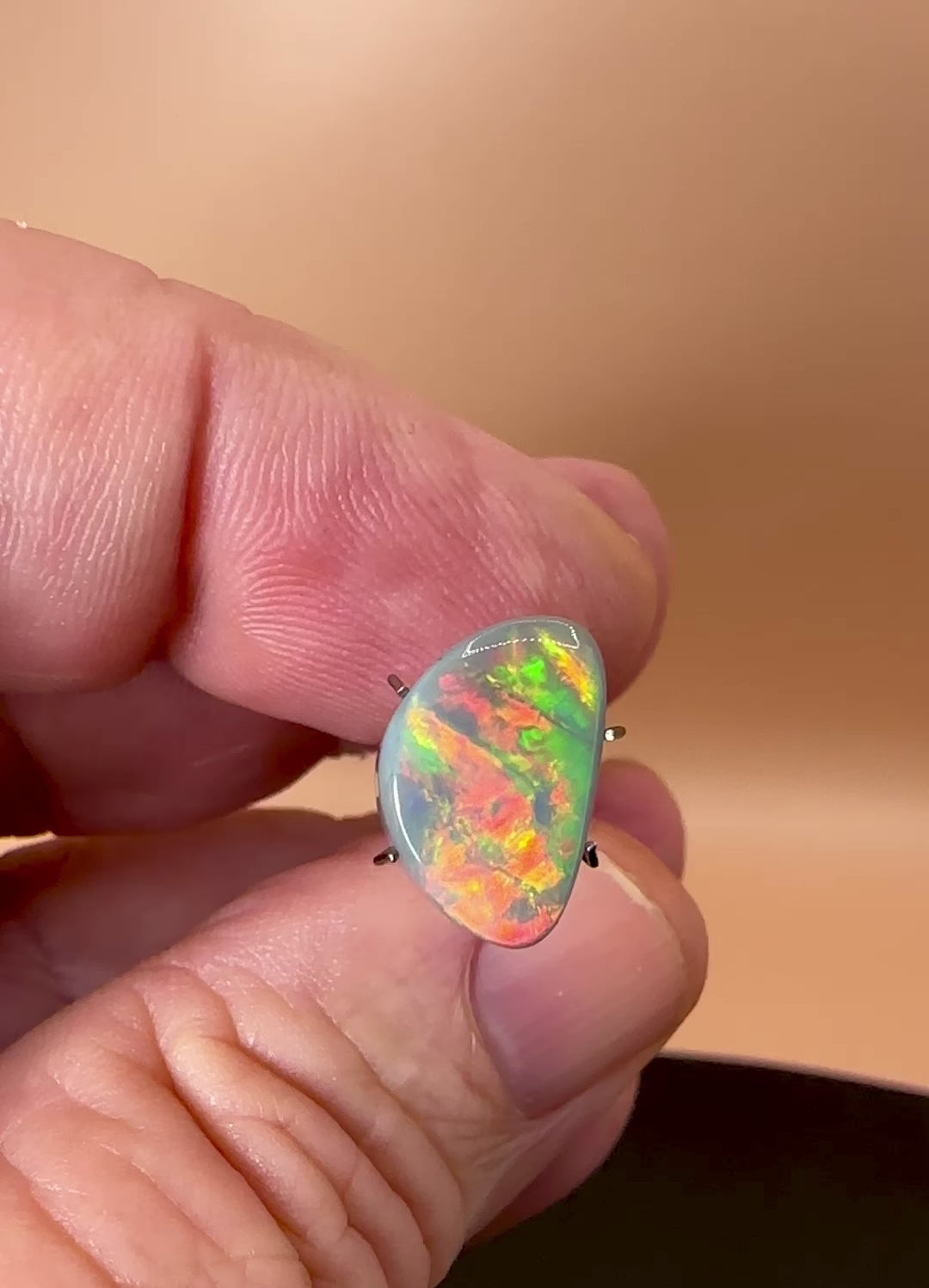 Discover the natural beauty of our 3.7ct Lightning Ridge Opal. This rare gem showcases vibrant colors of a sunrise, making it a unique addition to your opal collection.

Origin- Ethically mined in Lightning Ridge Australia

Opal Weight- 3.7ct Lightning Ridge Grey Base Opal

Size- 13.6 x 9mm

Stunning Opal ready to be set into Jewellery